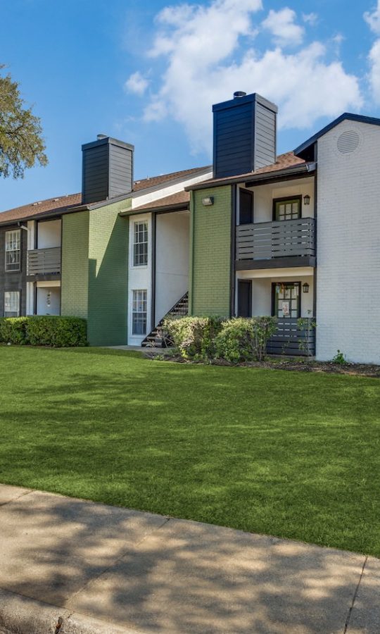 the green grass and trees at The Richmond