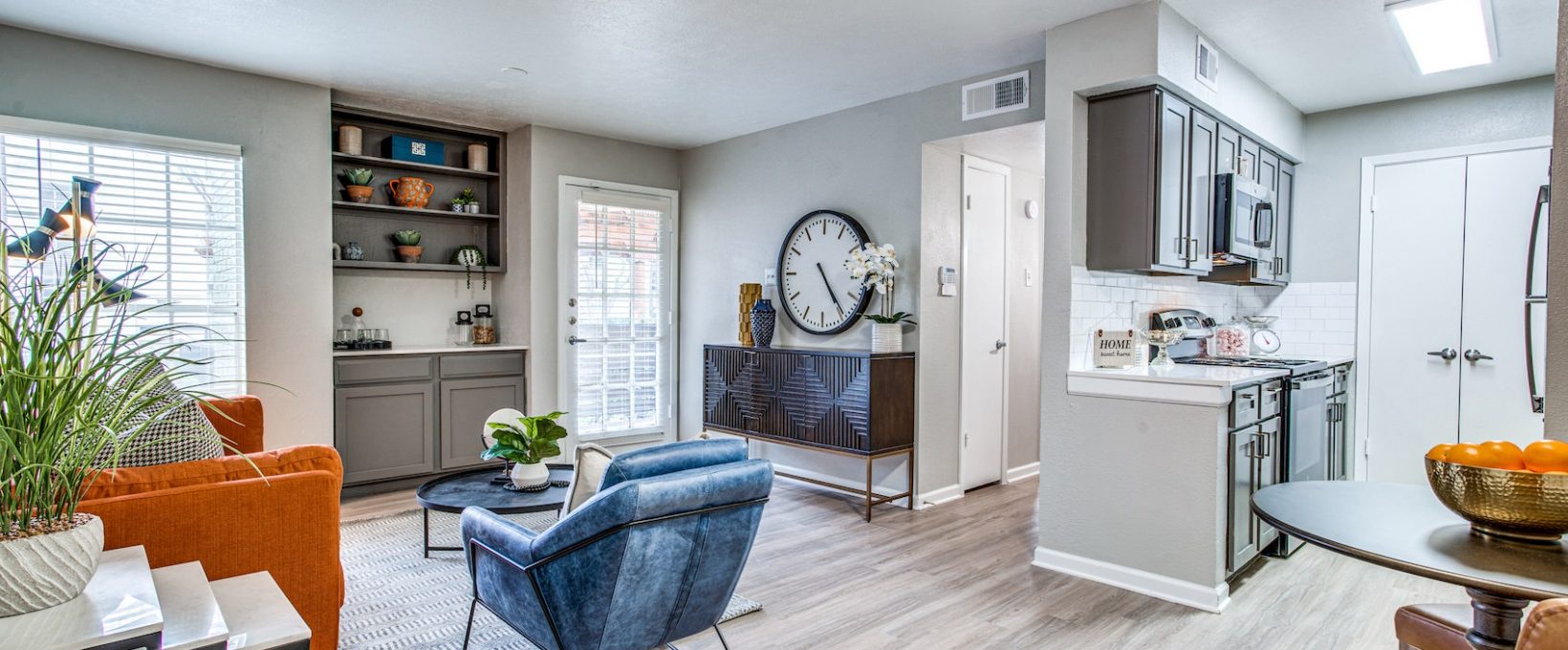 a living room and kitchen area at The Richmond