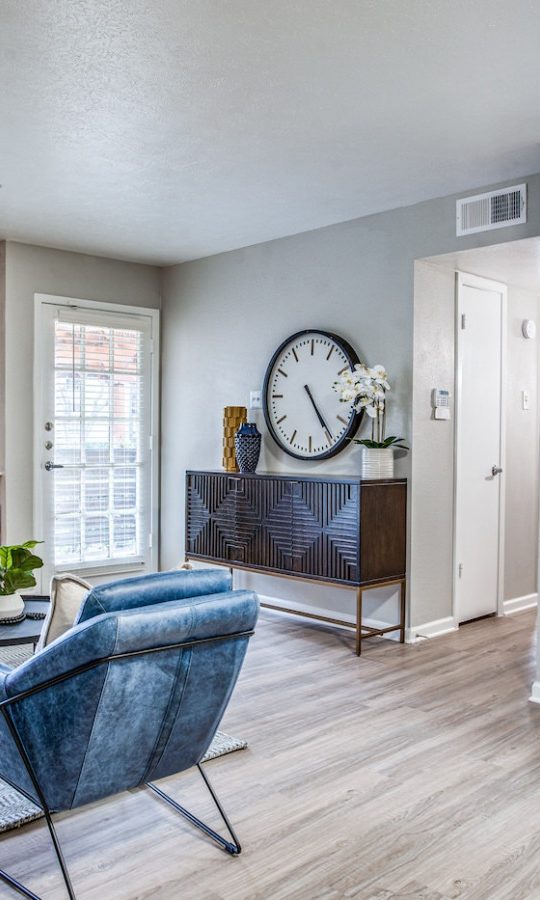 a living room and kitchen area at The Richmond