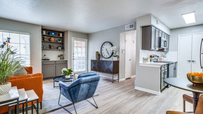 a living room and kitchen area at The Richmond